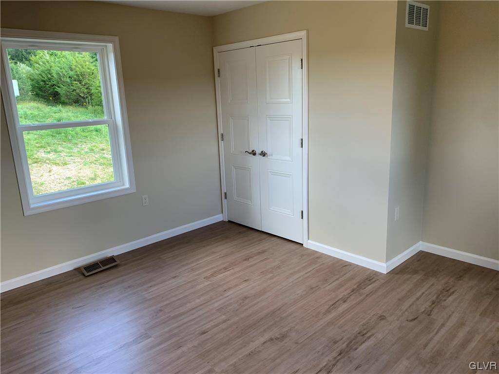 276 Hester Road Bangor, PA 18013 - Photo 24 of 26 a view of a room with wooden floor and window