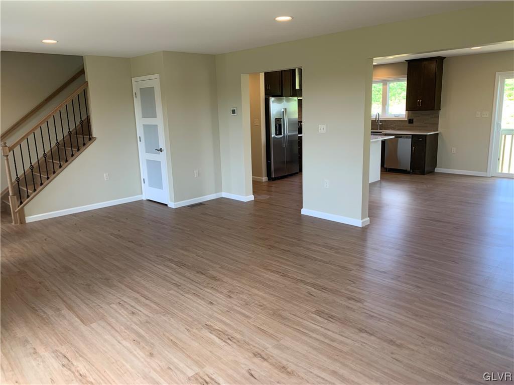 276 Hester Road Bangor, PA 18013 - Photo 6 of 26 a view of a kitchen with a fridge and wooden floor