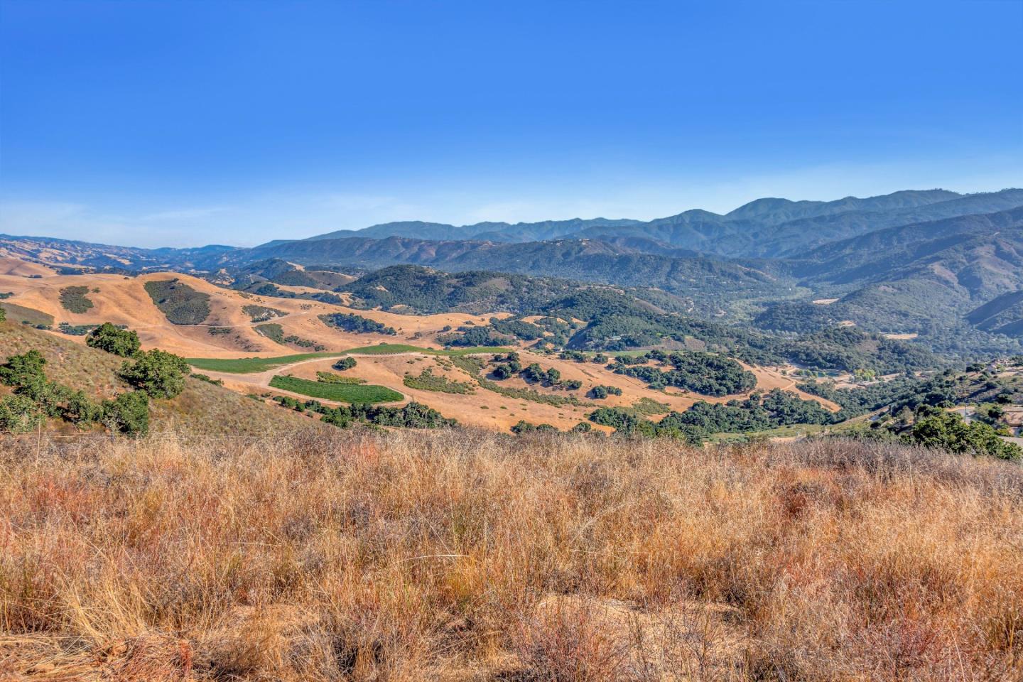 Weathertop Weathertop Ranch Carmel Valley, CA 93924 - Photo 14 of 19 a view of a lake with mountains in the background