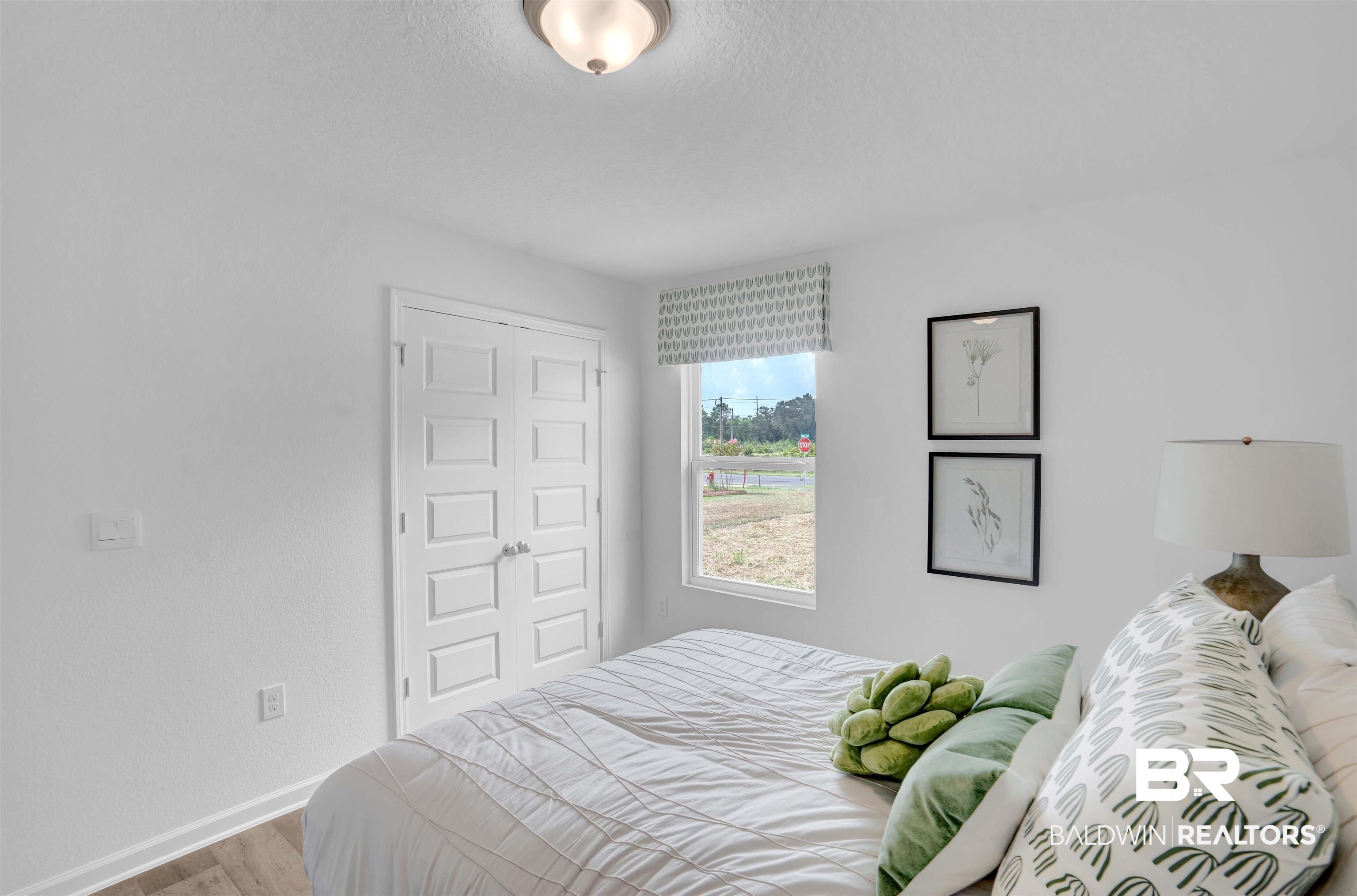 14717 Dayton Circle Foley, AL 36535 - Photo 10 of 39 Bedroom with light wood-type flooring and a closet