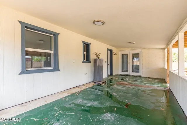 a view of an empty room with window