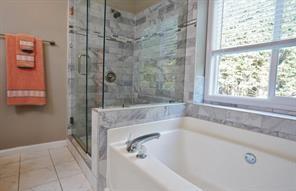 2525 Falcon Chase Court Suwanee, GA 30024 - Photo 14 of 27 a bath tub sitting next to a window