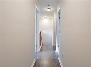 2525 Falcon Chase Court Suwanee, GA 30024 - Photo 18 of 27 a view of a hallway with wooden floor