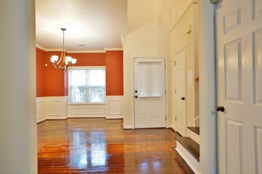 2525 Falcon Chase Court Suwanee, GA 30024 - Photo 6 of 27 a view of empty room with wooden floor and fan