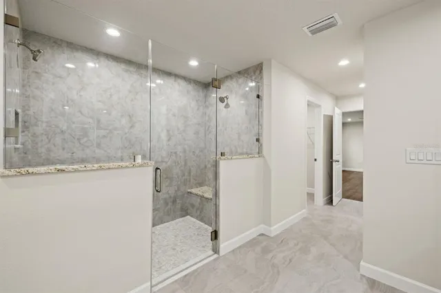 a view of a bathroom with shower