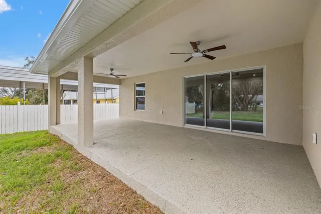 a view of a house with a big yard