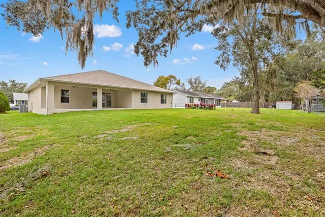 a front view of house with garden
