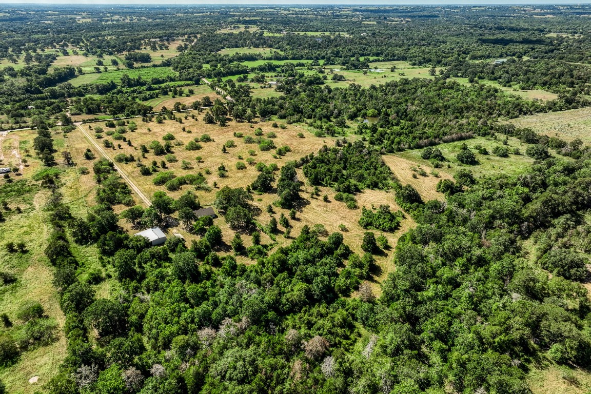 2700 Quarry Road Brenham, TX 77833 - Photo 35 of 35 an aerial view of residential houses with outdoor space and trees