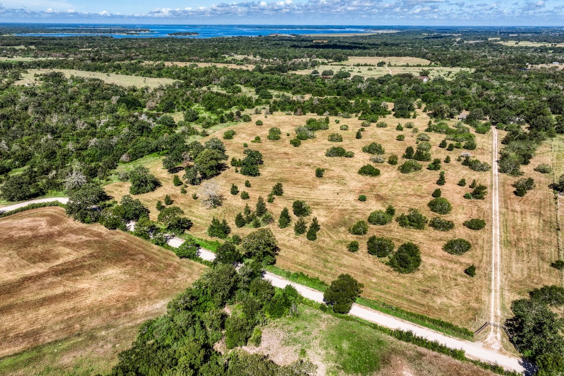 2700 Quarry Road Brenham, TX 77833 - Photo 4 of 35 a view of a yard with an outdoor space