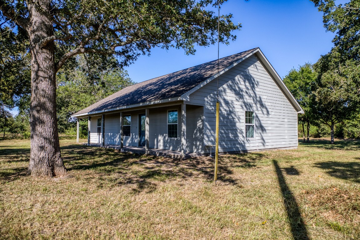 2700 Quarry Road Brenham, TX 77833 - Photo 7 of 35 a front view of a house with yard