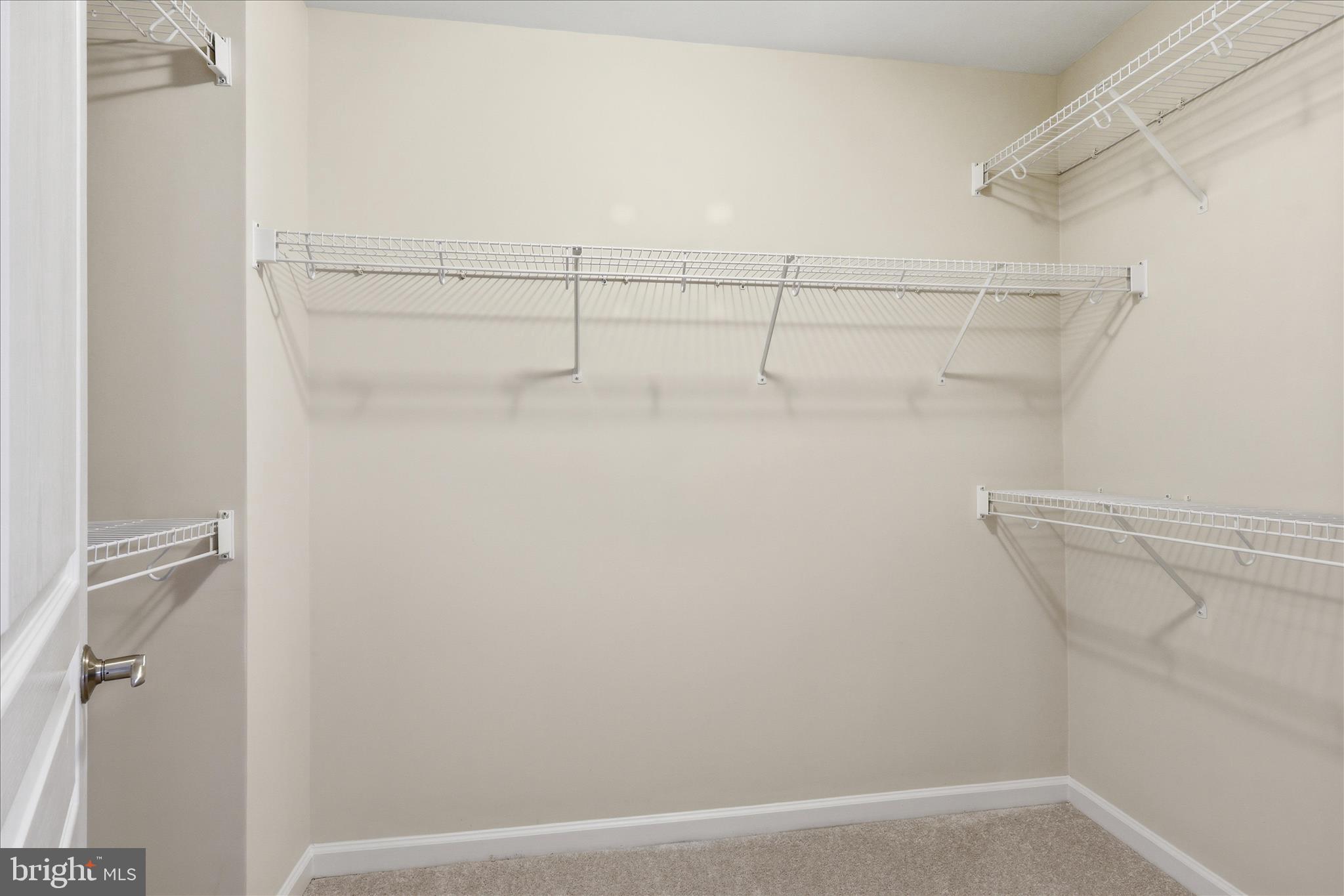 411 Spring Street Herndon, VA 20170 - Photo 28 of 46 a view of a room with racks on the wall