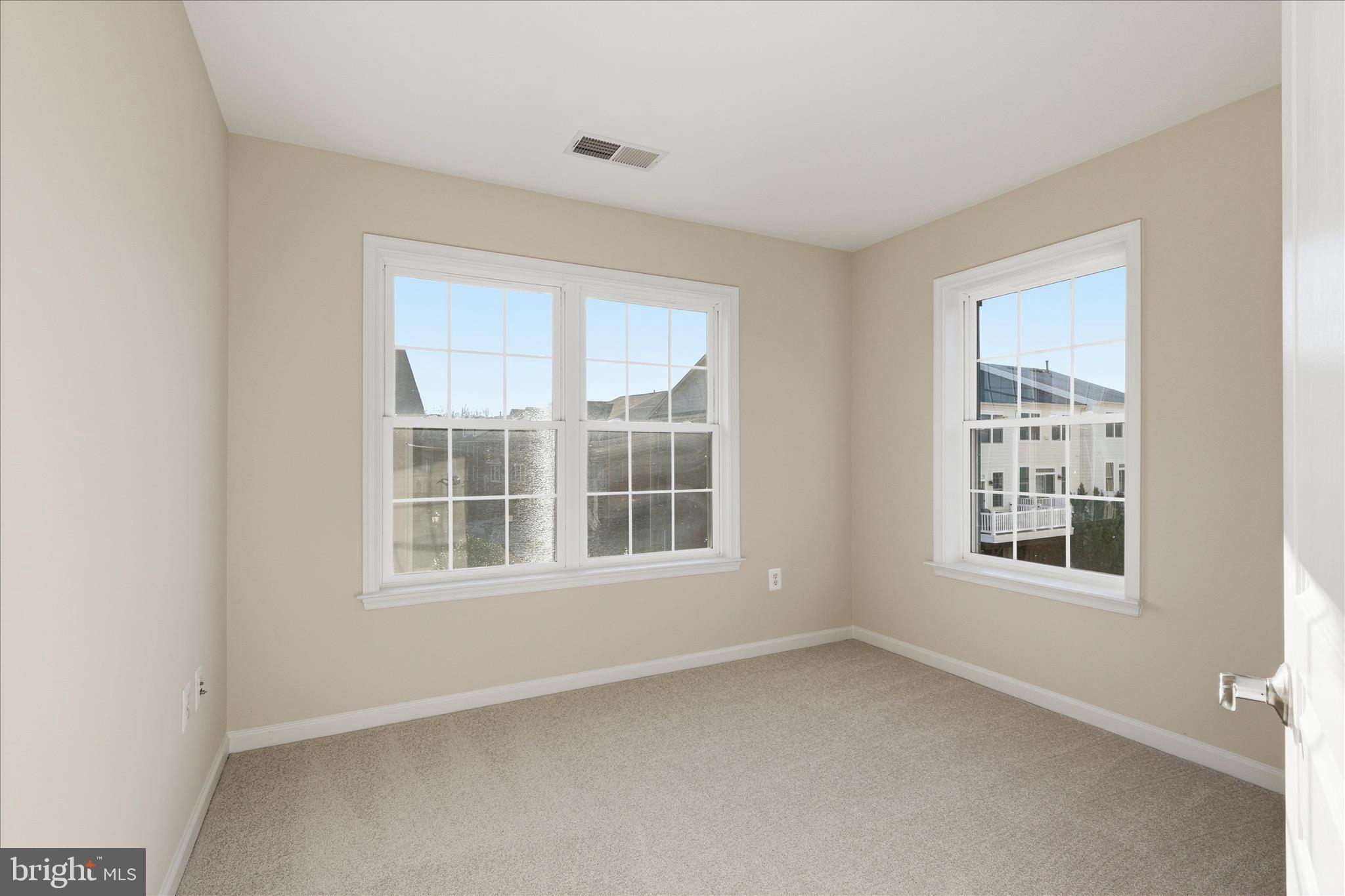 411 Spring Street Herndon, VA 20170 - Photo 31 of 46 an empty room with a window