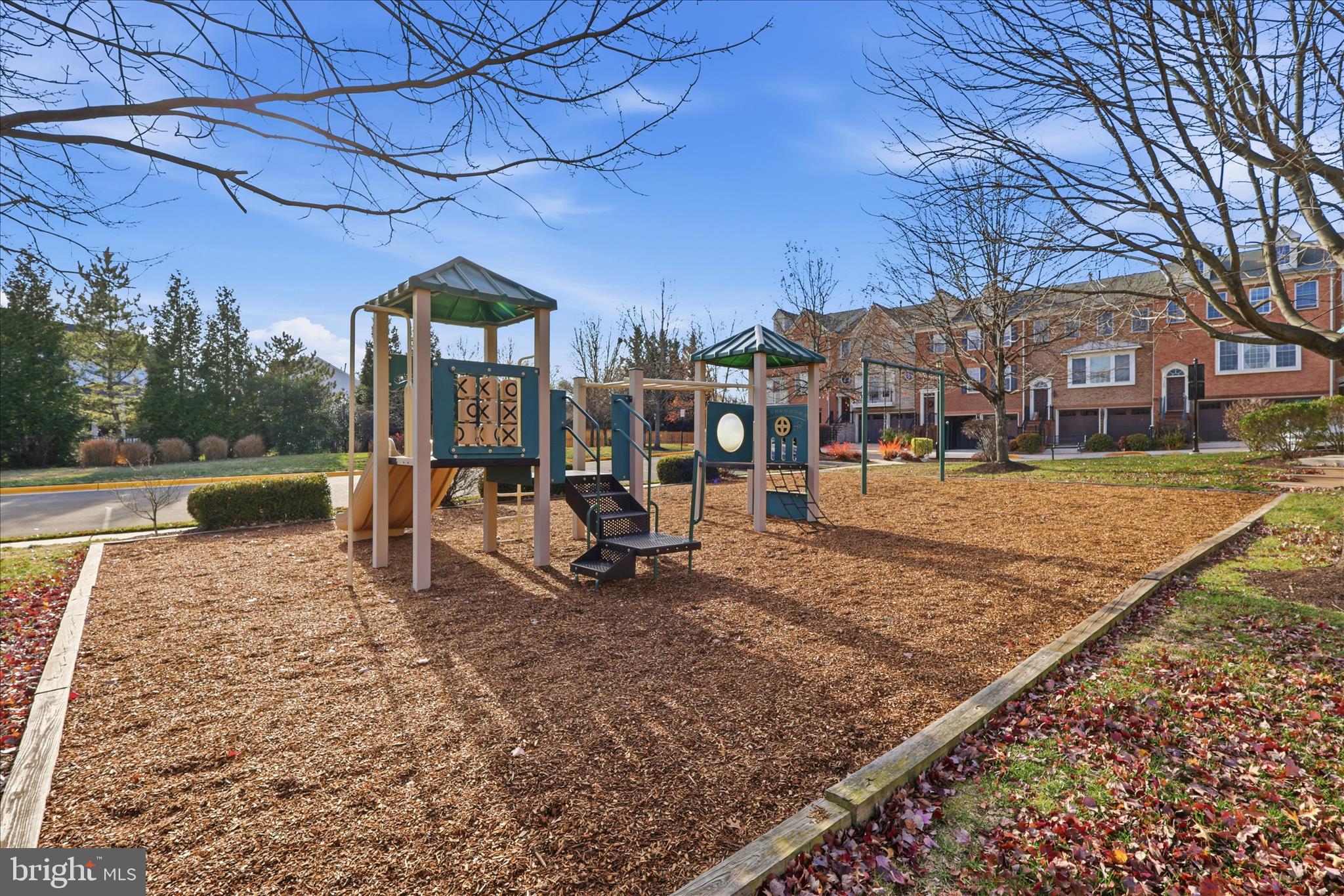 411 Spring Street Herndon, VA 20170 - Photo 41 of 46 a view of a building with a yard