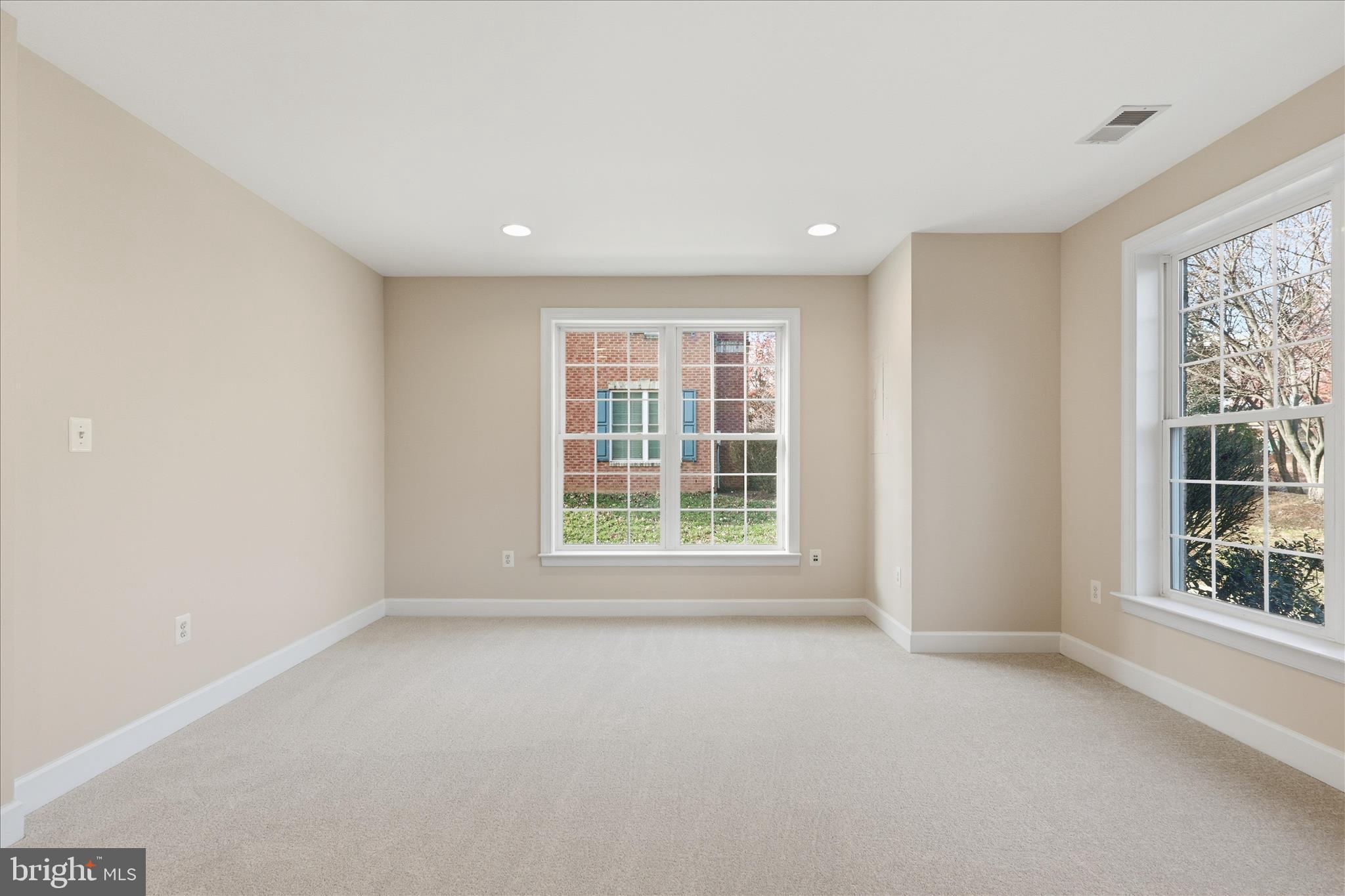 411 Spring Street Herndon, VA 20170 - Photo 8 of 46 a view of an empty room with a window