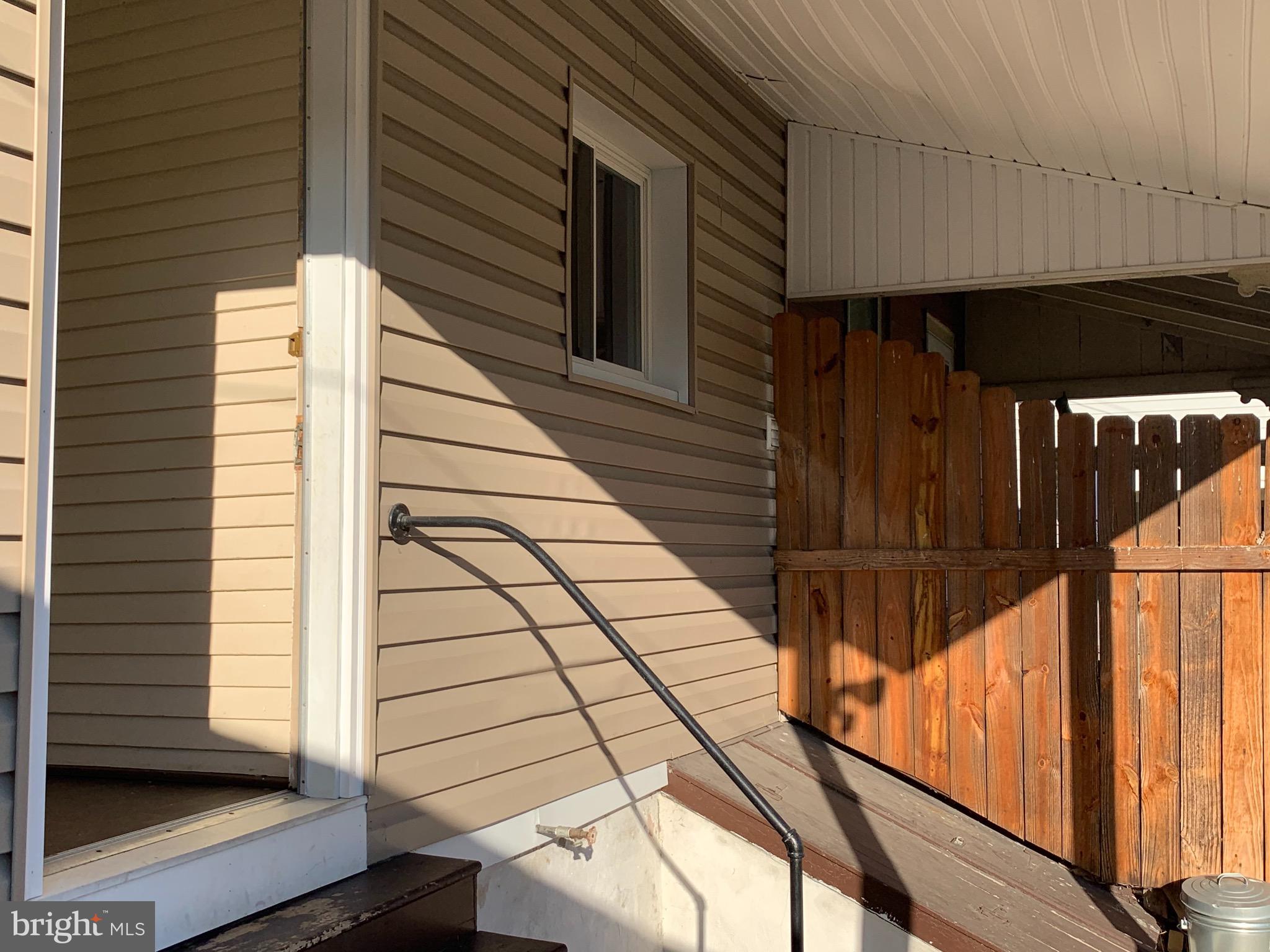 3458 Penn Avenue Sinking Spring, PA 19608 - Photo 33 of 36 Covered Patio with Basement Door