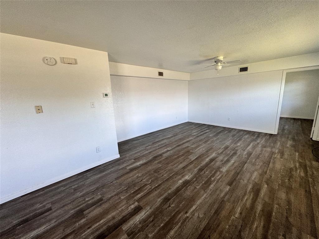 1808 Spring Lake West Brownwood, TX 76801 - Photo 12 of 12 a view of a hallway with wooden floor