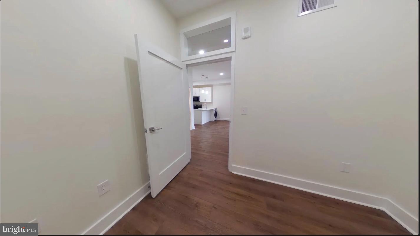 150 South Independence Mall West, Unit 802 Philadelphia, PA 19106 - Photo 9 of 9 a view of a hallway with wooden floor
