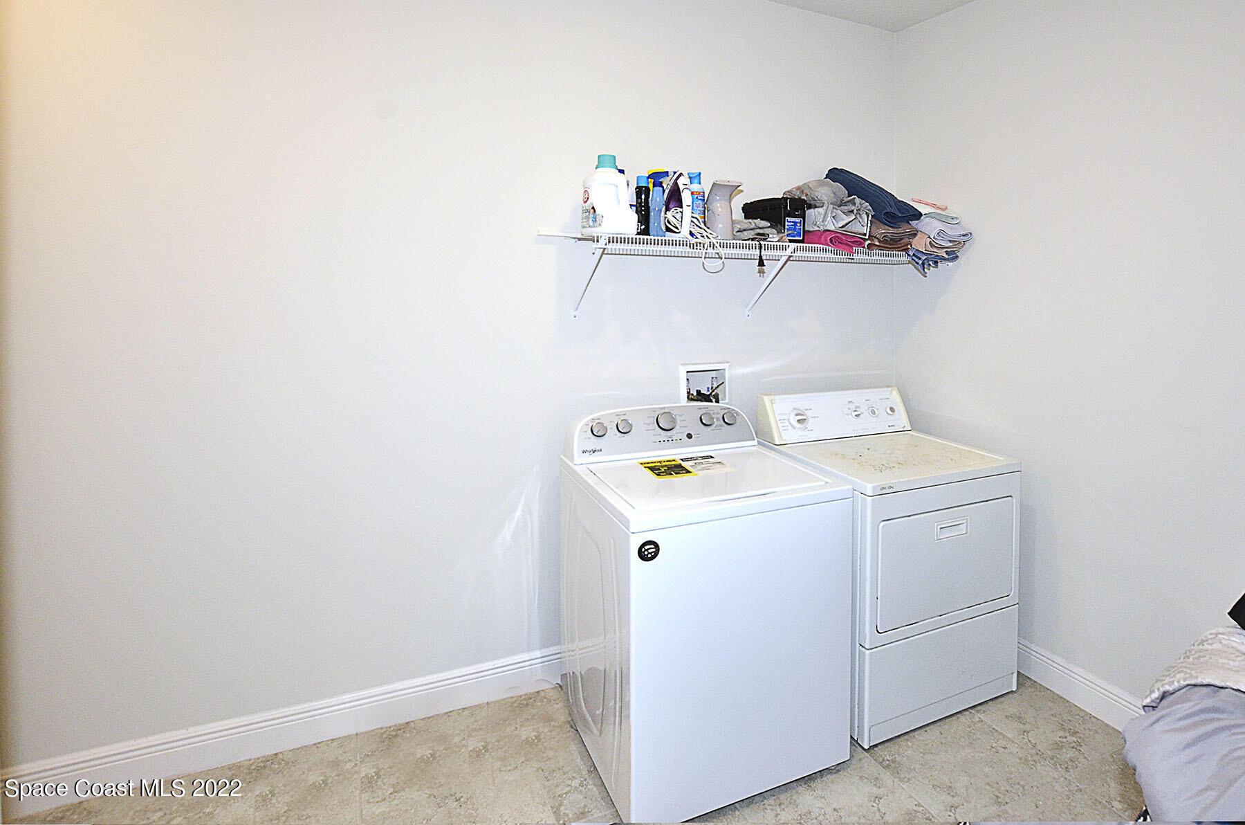 1923 Killian Drive Palm Bay, FL 32905 - Photo 28 of 44 a utility room with dryer and washer