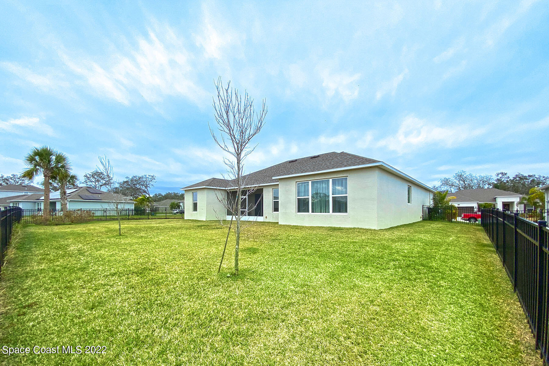 1923 Killian Drive Palm Bay, FL 32905 - Photo 40 of 44 a front view of a house with a yard