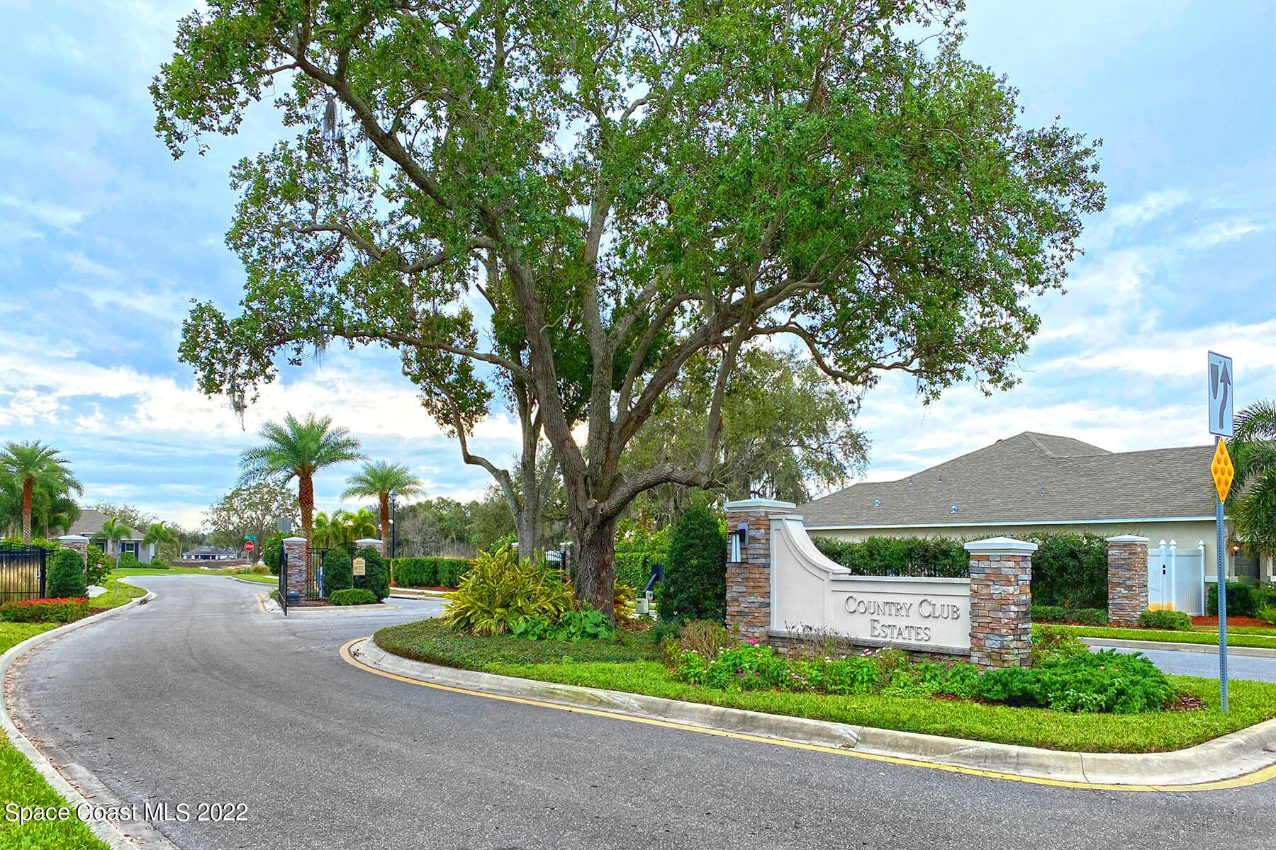 1923 Killian Drive Palm Bay, FL 32905 - Photo 43 of 44 a front view of a house with a yard and garage