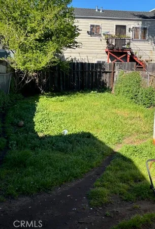 a view of a backyard with a garden