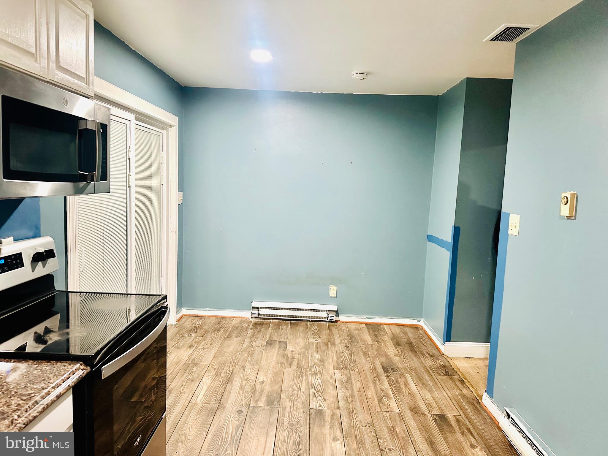 323 Russelcroft Road Winchester, VA 22601 - Photo 23 of 40 a view of a kitchen from the hallway