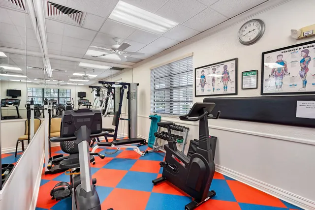 a room with furniture and pool table