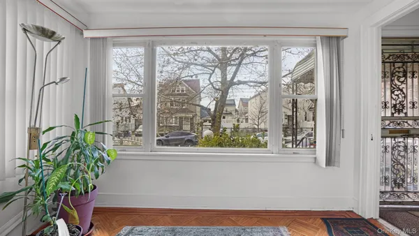 a view of balcony with furniture