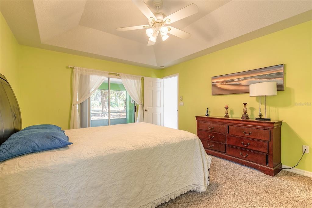 39 Princess Ruth Lane Palm Coast, FL 32164 - Photo 24 of 48 a bedroom with a bed and a window