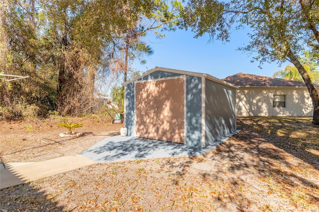 39 Princess Ruth Lane Palm Coast, FL 32164 - Photo 37 of 48 a view of a house with a snow in the yard