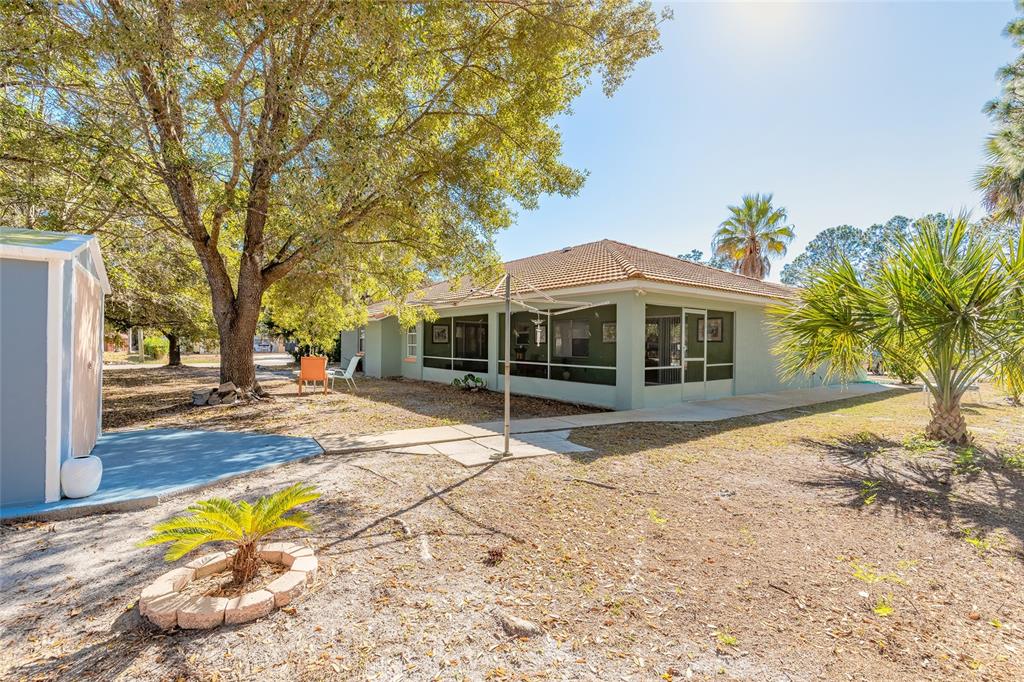 39 Princess Ruth Lane Palm Coast, FL 32164 - Photo 38 of 48 a house with trees in front of it