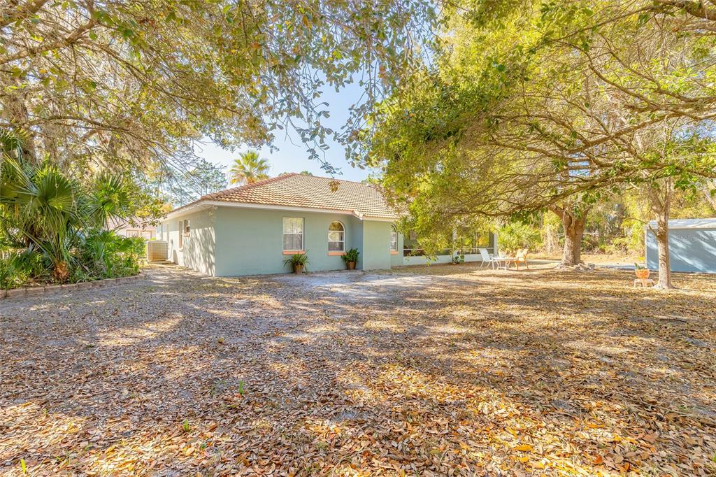 39 Princess Ruth Lane Palm Coast, FL 32164 - Photo 40 of 48 a view of a house with a garden