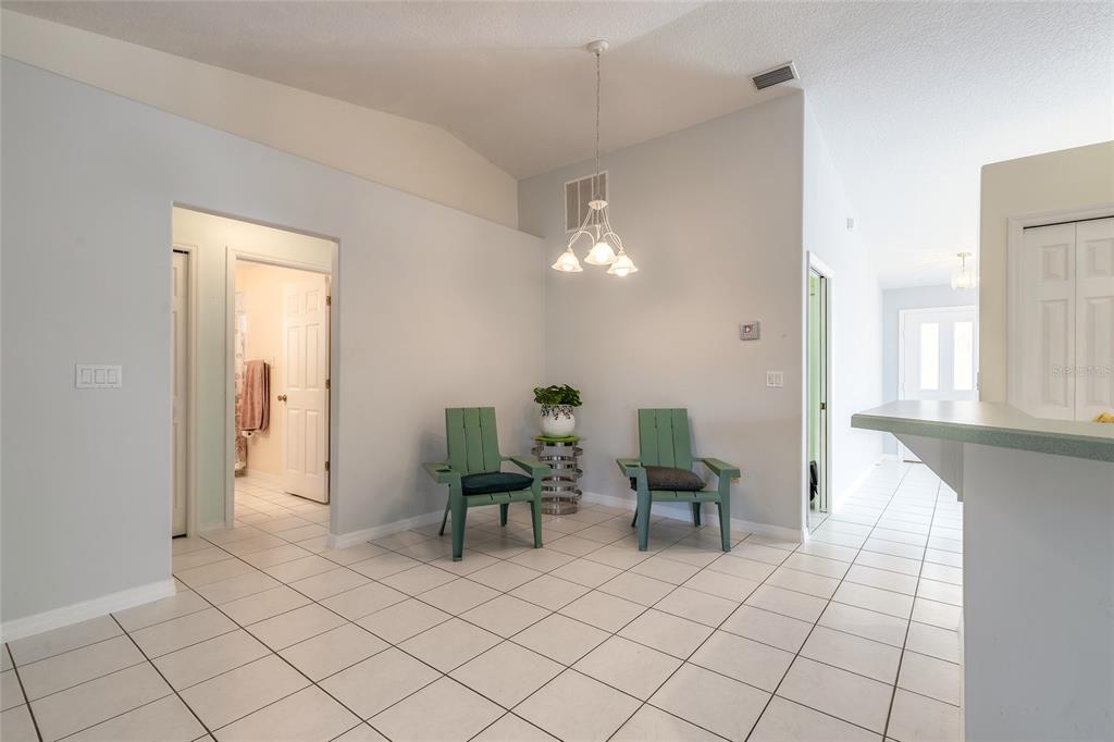39 Princess Ruth Lane Palm Coast, FL 32164 - Photo 6 of 48 a view of a livingroom with furniture and a window
