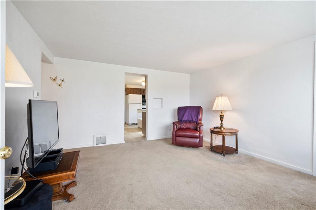 152 Valley Avenue Monongahela, PA 15063 - Photo 5 of 32 a room with furniture a desk and a chair