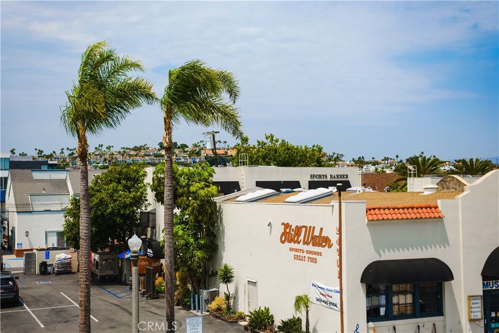 24722 Del Prado Avenue, Unit 303 Dana Point, CA 92629 - Photo 4 of 6 a view of a street with cars
