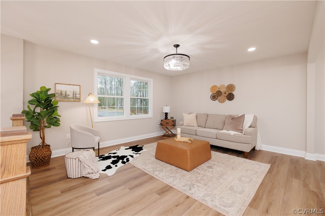 805 Adkins Road Chesterfield, VA 23236 - Photo 6 of 50 a living room with furniture and window