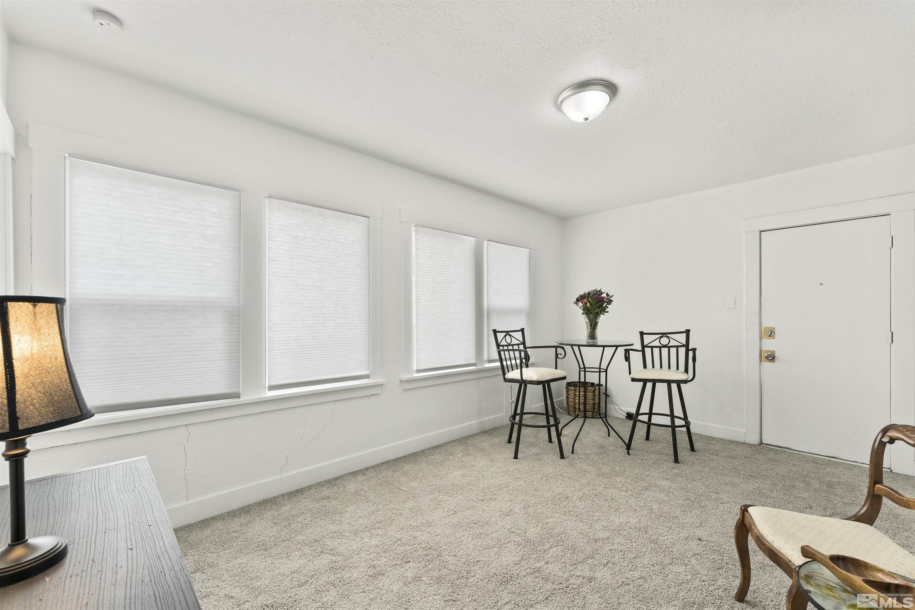 64 Keystone Avenue, Unit 6466 KEYSTONE AVENUE Reno, NV 89503 - Photo 15 of 36 a dining room with furniture and window