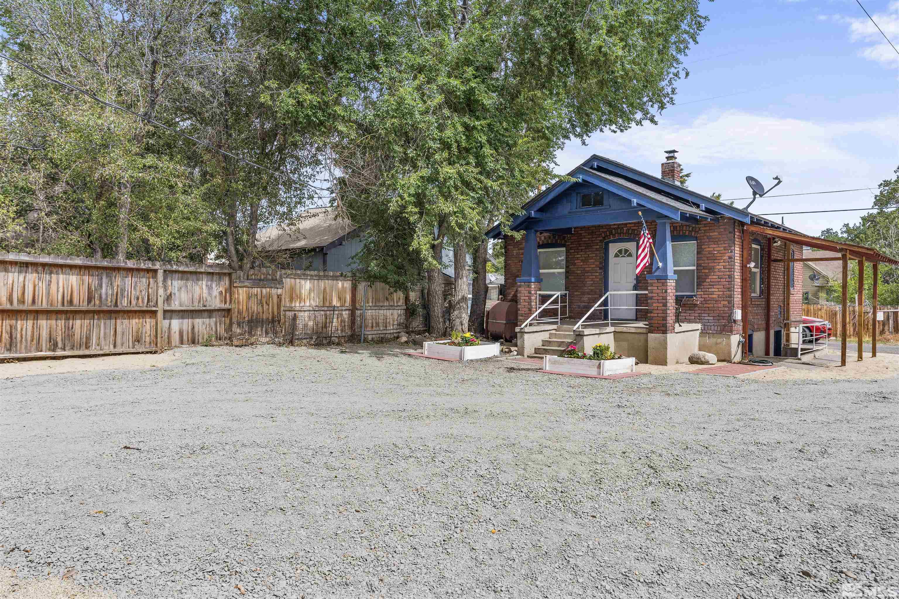 64 Keystone Avenue, Unit 6466 KEYSTONE AVENUE Reno, NV 89503 - Photo 22 of 36 a view of a house with a outdoor space