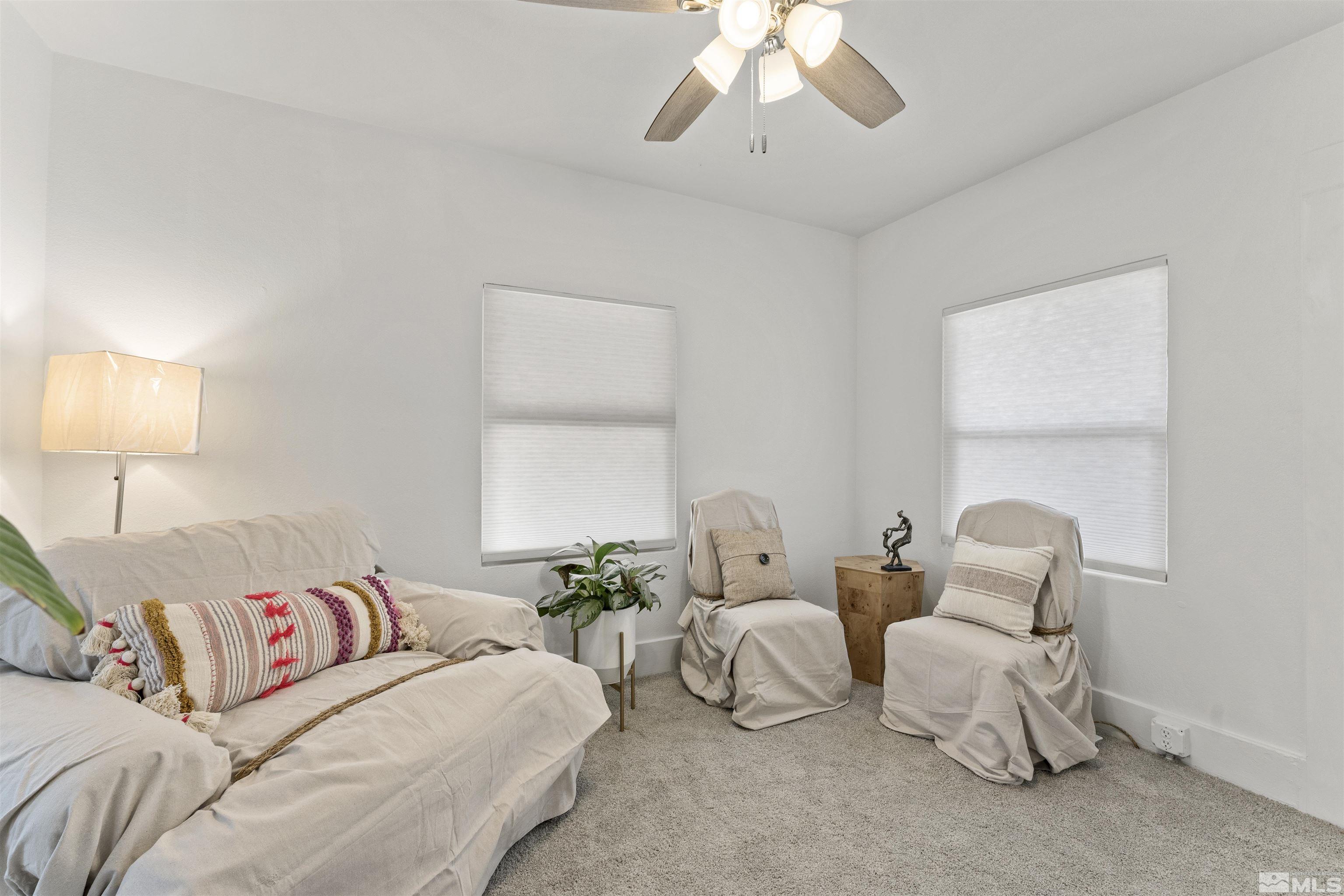 64 Keystone Avenue, Unit 6466 KEYSTONE AVENUE Reno, NV 89503 - Photo 27 of 36 a bedroom with bed and window