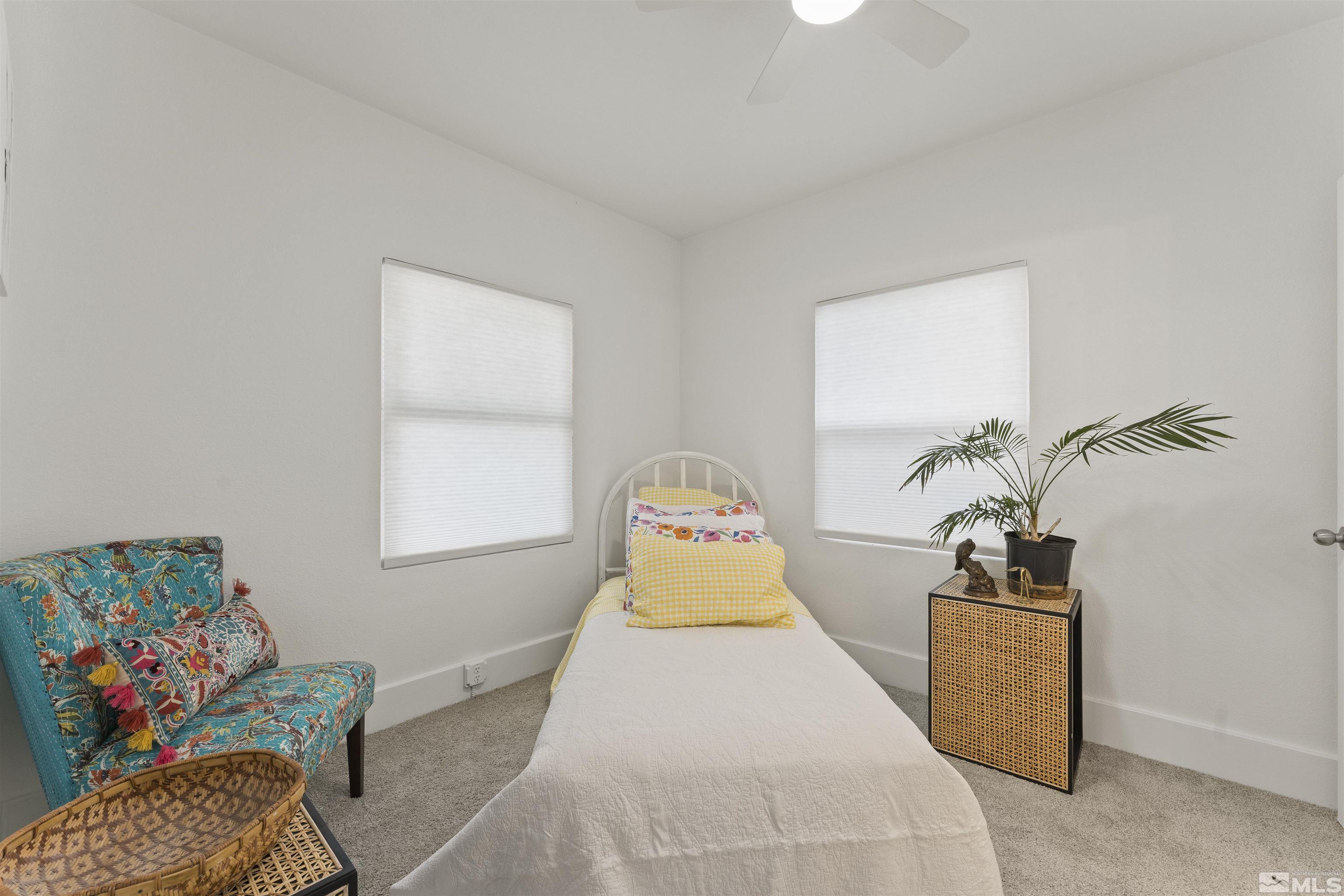 64 Keystone Avenue, Unit 6466 KEYSTONE AVENUE Reno, NV 89503 - Photo 31 of 36 a bedroom with a bed and window