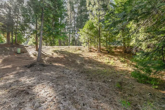 a view of wooden deck with wooden fence