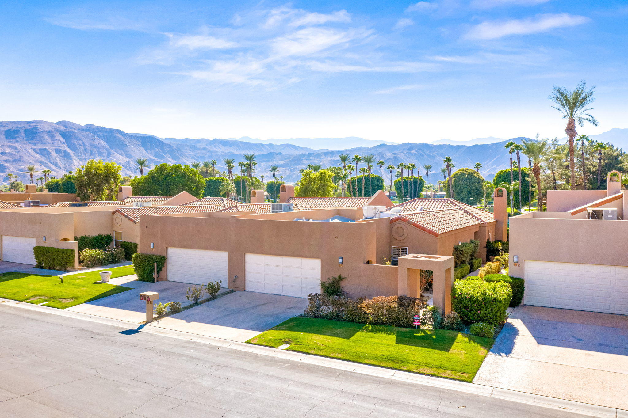 151 Lakeshore Drive Rancho Mirage, CA 92270 - Photo 1 of 37 a view of a patio with a garden and mountain view