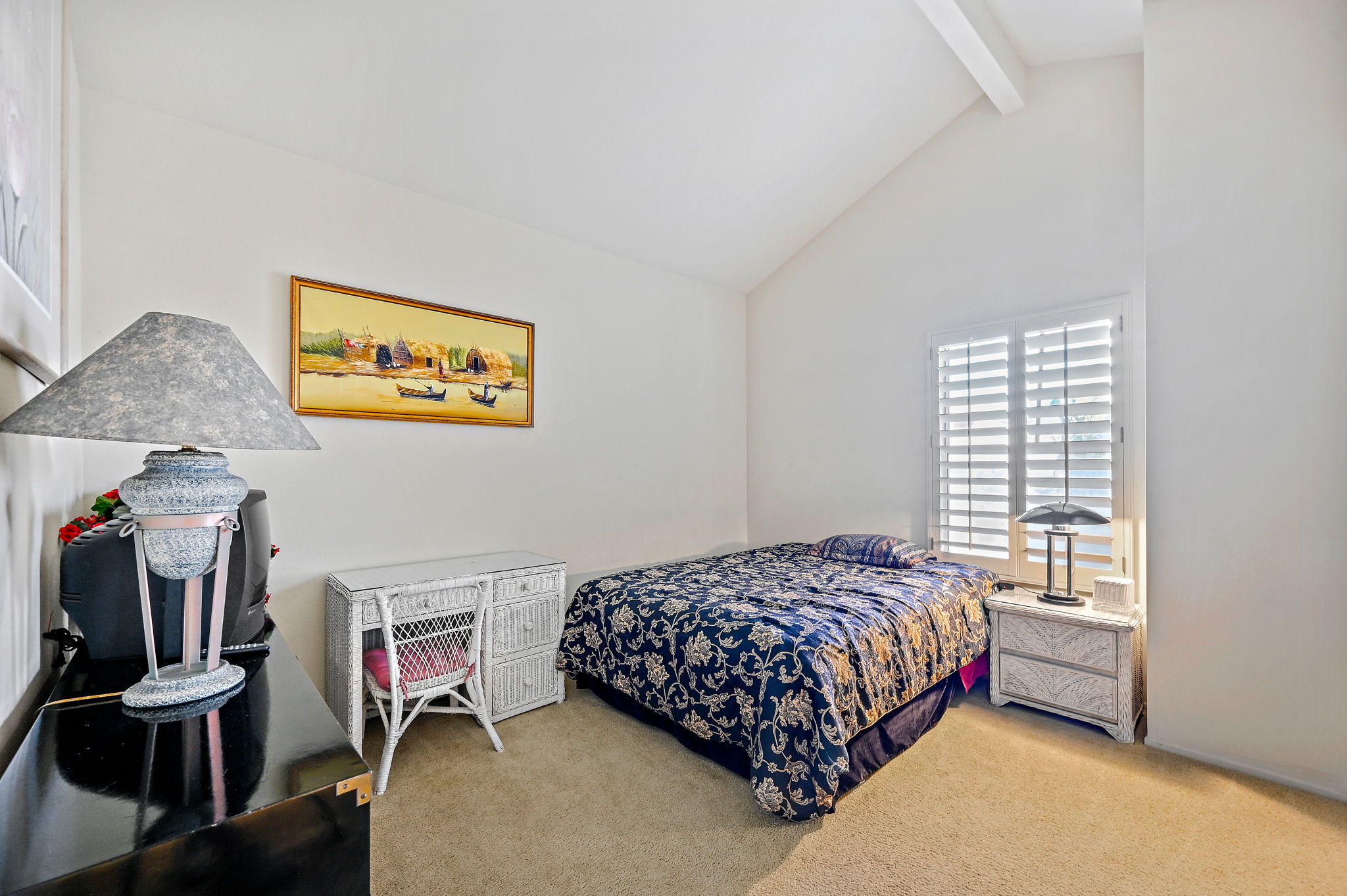 151 Lakeshore Drive Rancho Mirage, CA 92270 - Photo 25 of 37 a bedroom with a bed and a desk