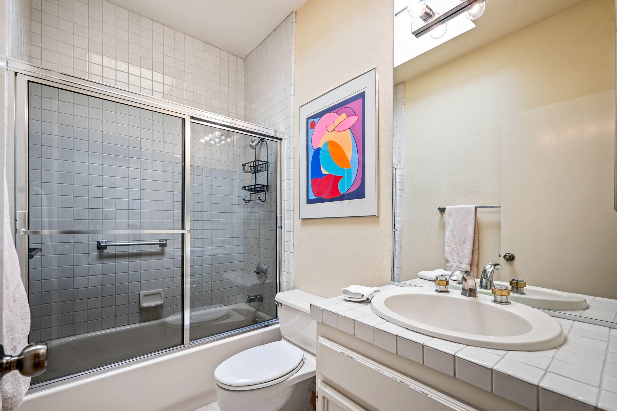 151 Lakeshore Drive Rancho Mirage, CA 92270 - Photo 26 of 37 a bathroom with a sink a toilet and shower