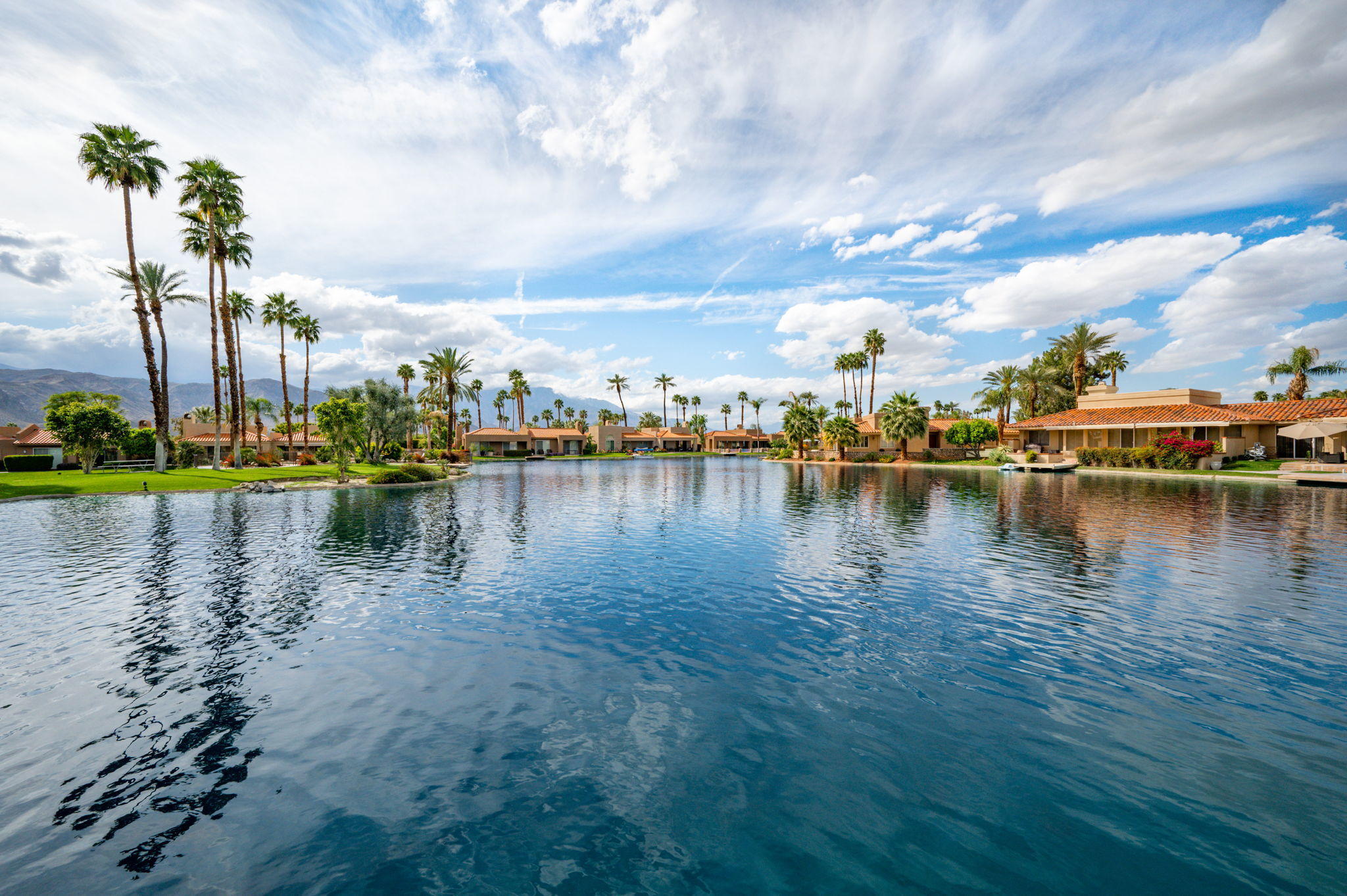 151 Lakeshore Drive Rancho Mirage, CA 92270 - Photo 37 of 37 a view of a lake with houses in the back