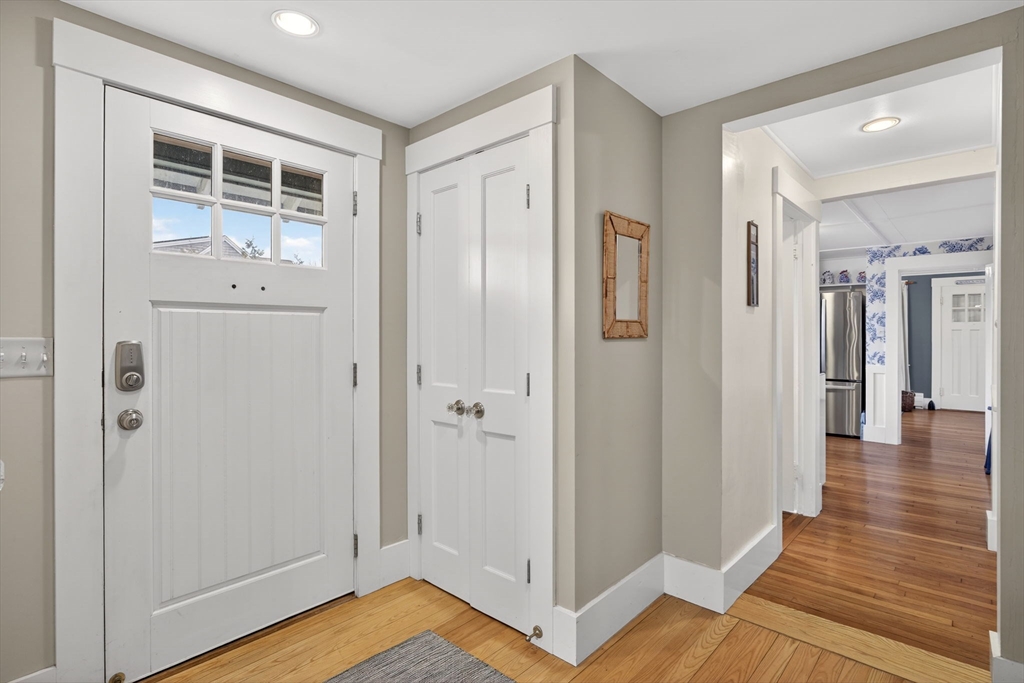89 Rock Harbor Road Orleans, MA 02653 - Photo 15 of 39 a view of a hallway with wooden floor and closet area