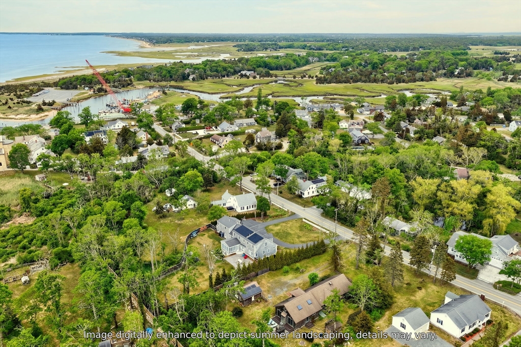 89 Rock Harbor Road Orleans, MA 02653 - Photo 3 of 39 a view of a city with lots of trees