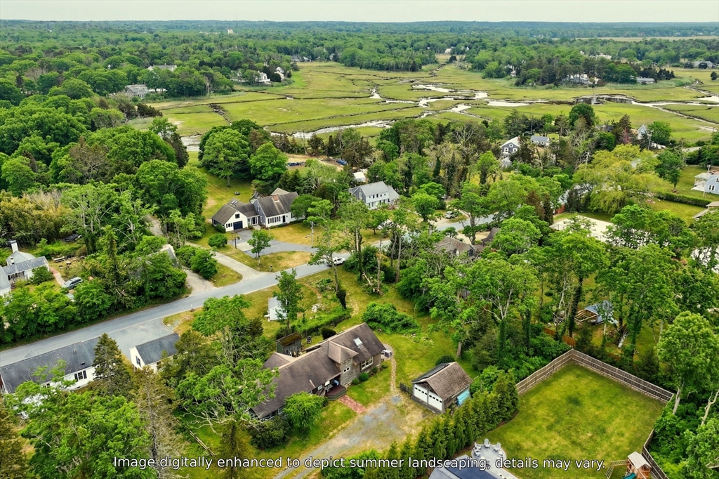 89 Rock Harbor Road Orleans, MA 02653 - Photo 32 of 39 an aerial view of residential houses with outdoor space and trees