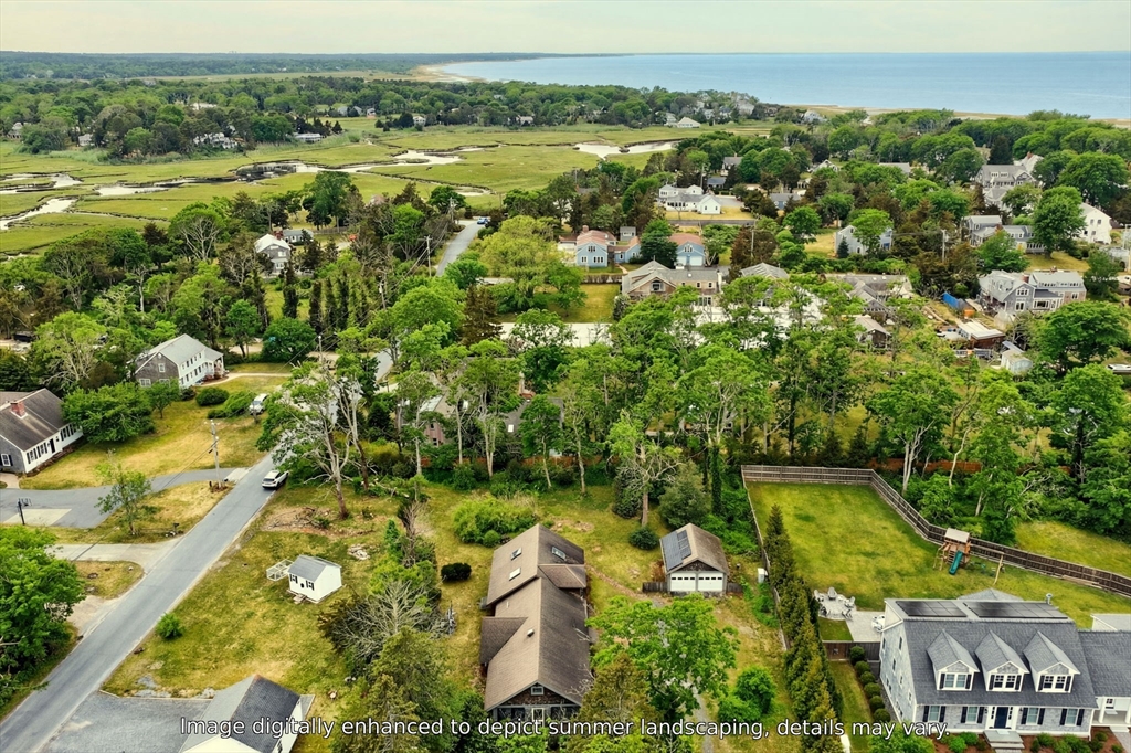 89 Rock Harbor Road Orleans, MA 02653 - Photo 36 of 39 an aerial view of residential houses with outdoor space and trees