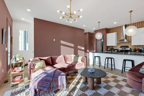 a kitchen with a sink cabinets and appliances
